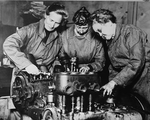 women working on machines